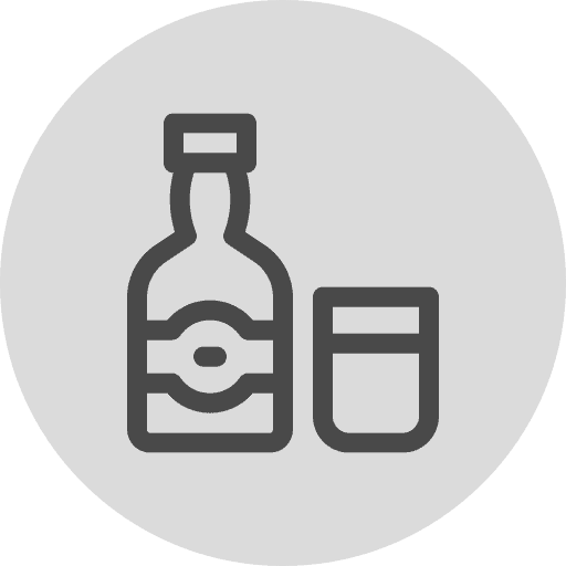 Icon of a liquor bottle next to a glass, set against a gray circular background.